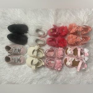 8 pairs of Nike, Michael Kors, and sandals baby girl shoes